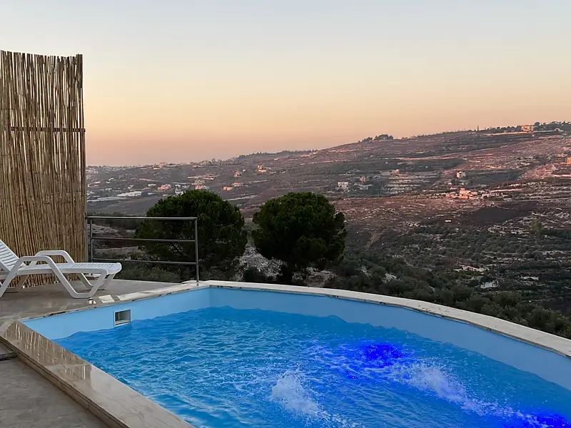 The turquoise pool on a clear afternoon